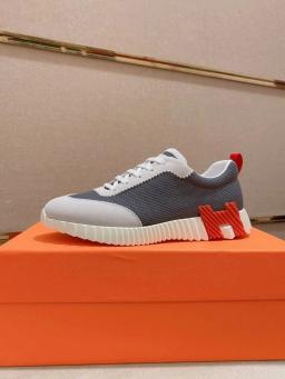 White face, gray color, orange letters