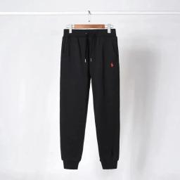 Black pants with red label