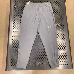 Nike 灰色束脚裤